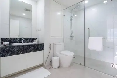 a bathroom with a toilet and a sink and a shower at Patong Tower Brand New 1-Bedroom , Near Beach in Patong Beach