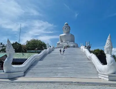a giant buddha statue on a stairway at Villa Brianna Luxuria 2 - Rawai in Phuket Town