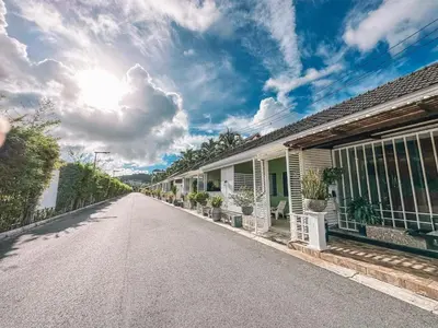 an empty street in front of a house at Favorite Place in Kata Beach
