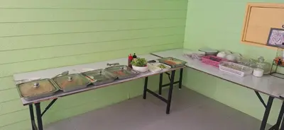 a counter with four sinks in a green room at Favorite Place in Kata Beach