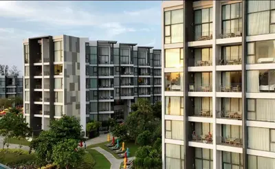 an image of an apartment building at Cassia 2 BR Lake&Road View apt by NLA in Bang Tao Beach