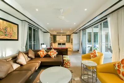 a living room with a couch and chairs at Katamanda Villa Mila A1 near Kata Beach in Kata Beach