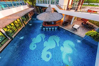 an overhead view of a swimming pool in a building at Chalong Miracle Lakeview in Chalong