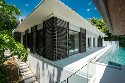 an external view of a house with a pool at Full Seaview 5BR Villa Serenity, Elite Living at Cape Yamu in Ban Bang La