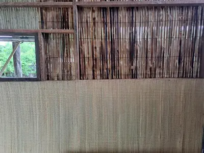 a wall of a room with a window at Big Hug Home-Nok kao house in Ko Yao Noi