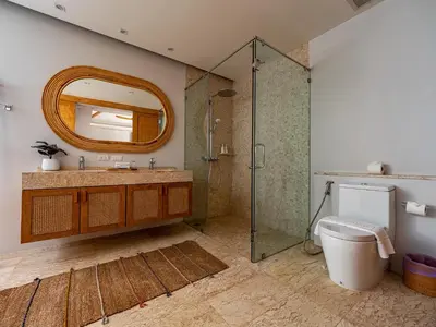 a bathroom with a shower and a toilet and a mirror at Exclusive Villa Botanica in Bang Tao Beach