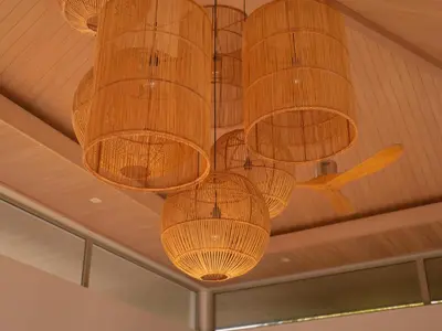 a bunch of cages hanging from a ceiling at Exclusive Villa Botanica in Bang Tao Beach