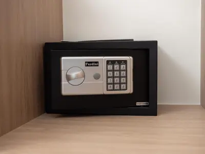 a black and silver microwave oven sitting on a floor at Laguna SkyPark new brand apartments in Phuket Town
