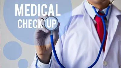 a man wearing a medical check up sign with a stethoscope at Kamala Beach D723 Exclusive 2 bedroom Suite in Kamala Beach