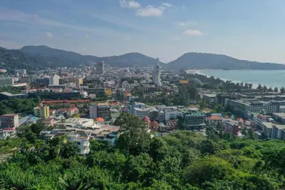 a view of a city with the water and mountains at 5BR Jungle Seaview Villa Patong in Patong Beach