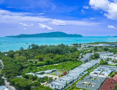 an aerial view of a resort with the ocean at Andaman Sea Best Pool Access and Villas in Chalong
