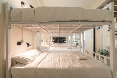a bedroom with two bunk beds in a room at Beds Friends Phi Phi Hostel - Party Hostel in Phi Phi Don