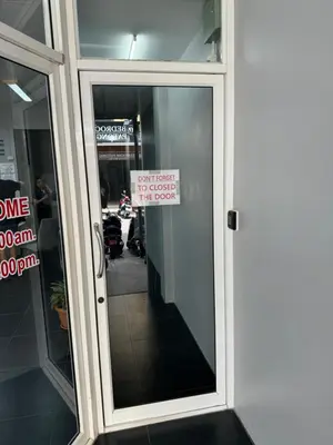 a sign is posted on the door of a restaurant at S a f e Residence Patong in Patong Beach