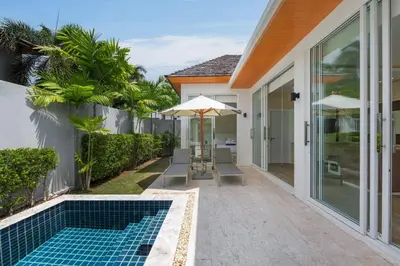 an external view of a villa with a swimming pool at Villa Maya 2BR private pool villa Nai Harn beach in Rawai Beach