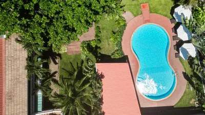an overhead view of a swimming pool in a yard at Touch Sea Boutique Hotel&Bistro in Karon Beach