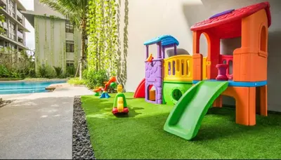 a childrens play area with a toy playground at Diamond Phuket Bang Tao in Bang Tao Beach