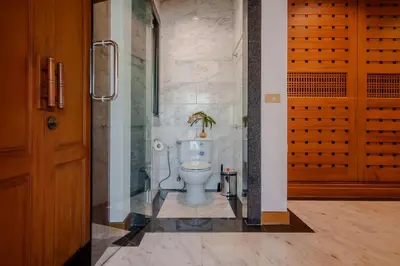 a bathroom with a toilet in a room at Solas Pool Villa Grand Villa With Private Pool in Rawai Beach