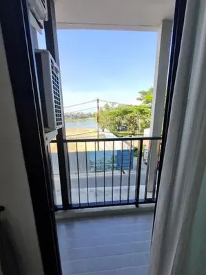 a view of a balcony from a room with a window at Lovely apartment in Bang Tao - Zcape X2 Condo in Phuket Town