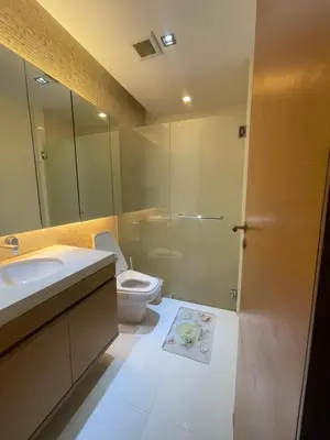 a bathroom with a toilet and a sink and a shower at Naithon beach WERT in Phuket Town