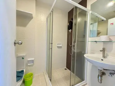 a bathroom with a shower and a sink at Zcape X2 Condos in Bangtao in Bang Tao Beach
