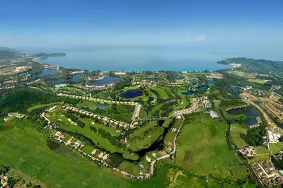 an aerial view of a park next to a body of water at Spacious 2BR Apartment ALM 2223 in Laguna, 10 min from BangTao Beach in Bang Tao Beach