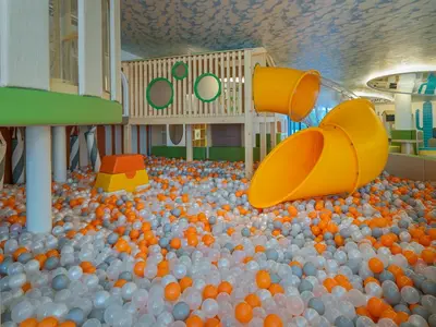 a large pile of balls in a childrens playground at La Green Hotel and Residence in Bang Tao Beach
