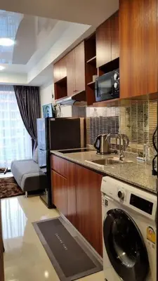 a kitchen with a washing machine and a sink at CB408 Apartament Beach condo 777 in Phuket Town