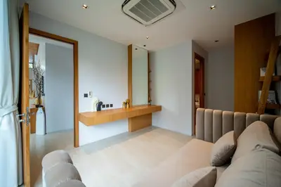 a living room with a couch and a sink at Botanica Foresta 4BR Luxury Villa with Pool by NLA in Bang Tao Beach