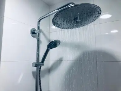 a shower with a shower head in a bathroom at Phuket Villa Patong- Pool View in Patong Beach