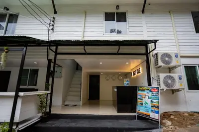 a building with a sign in front of it at The Bright House, Koh Phi Phi in Phi Phi Don