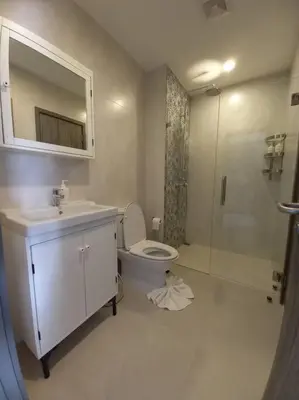 a bathroom with a sink and a toilet and a shower at B6 НОВАЯ на БАССЕЙН ВАТСАП669З582I976 in Nai Yang Beach