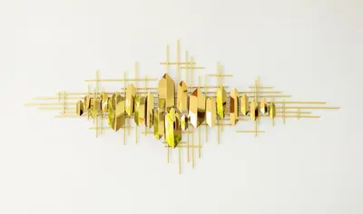 a chandelier with yellow and gold fixtures on a white background at Rudi Condo by Q Conzept in Kata Beach