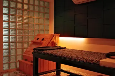 a bedroom with a bed and a table with a lamp at City Gate Kamala D209 by Phuket Sabay Rent in Phuket Town
