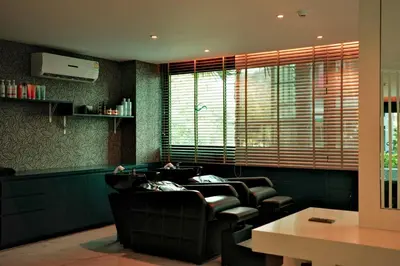 a waiting room with a bunch of chairs and a window at City Gate Kamala D209 by Phuket Sabay Rent in Phuket Town
