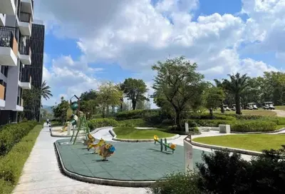 a park with a playground with a slide at \u666e\u5409\u5c9bLaguna\u6d77\u6ee9\u8c6a\u534e\u5929\u9645\u6cf3\u6c60\u516c\u5bd3\uff0c\u5962\u534e\u4f53\u9a8c\u4e0e\u4f11\u95f2\u4e4b\u9009 in Phuket Town