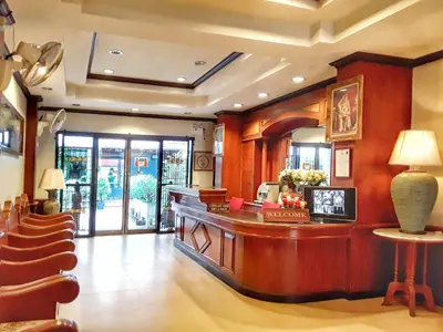 a lobby with a cash register in a store at Sawasdee Apartment Patong in Patong Beach