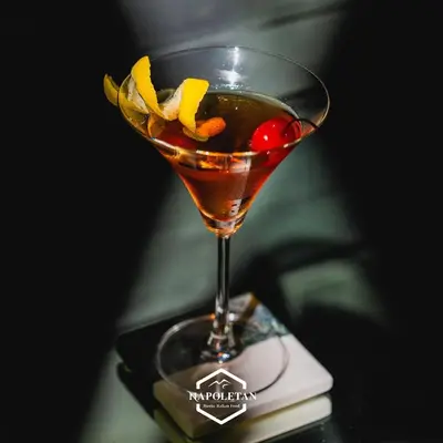 a drink in a glass with fruit on top at Villa 242 - private pool, fast internet in Ban Thalat Choeng Thale