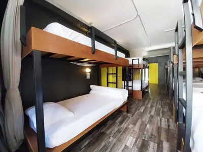 a group of bunk beds in a room at W168 hostel in Ban Lo Long