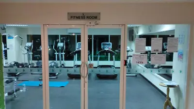a gym with a fitness room with machines at Phuket Villa Patong Beach by Naphat in Patong Beach