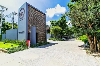 a brick building with a sign on the side of it at Villa Casablanca in Ban Saiyuan (1)