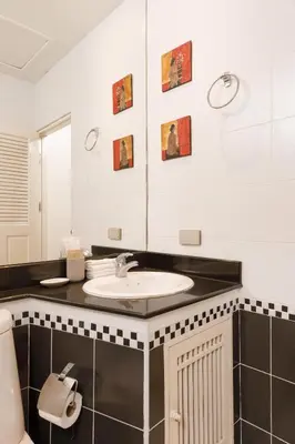 a bathroom with a sink and a mirror at Villa with pool, garden and terrace - Kamala #123 in Phuket Town