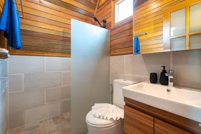 a bathroom with a white toilet and a sink at Tropical Chalet 2BR Villa Pasak Paradise 1 with Private Pool, Laguna 10 min drive in Bang Tao Beach