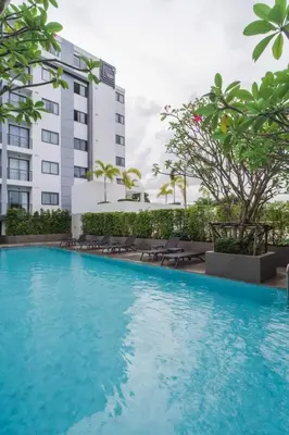 a large swimming pool in front of a building at The Tower Condo Phase3 in Ban Klang