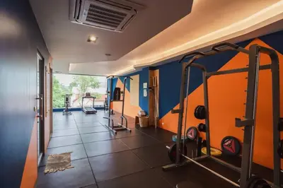 a room with a gym with a gym at The Tower Condo Phase3 in Ban Klang
