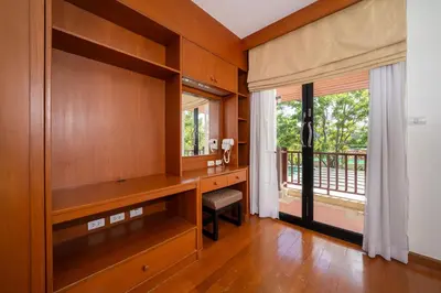 a home office with a desk and a balcony at Angsana Villas Laguna-3 Bedroom Pool Villa in Phuket Town