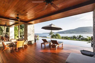 an open deck with a view of the ocean at Andarada Seaview in Kamala Beach