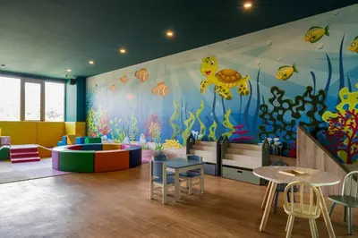 a childrens room with an ocean themed wall at OCEANA HOME Phuket Kamala in Kamala Beach