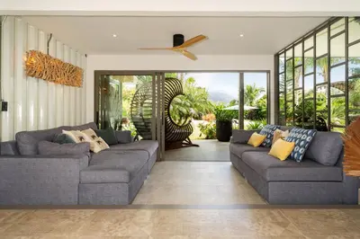 a living room with two couches and a ceiling fan at Contemporary Eden - Villa Jeladore, 5BR, Garden & Pool, near Laguna in Bang Tao Beach