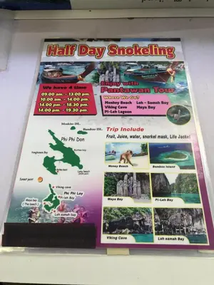 a sign for a thai day snorkeling attraction at Nacha Hostel, Koh Phi Phi, Krabi. THAILAND in Phi Phi Don