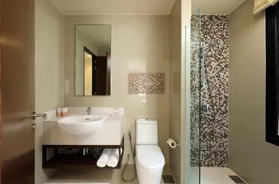a bathroom with a sink and a toilet and a shower at Laguna Park Grand Villa na Bang Tao in Phuket Town